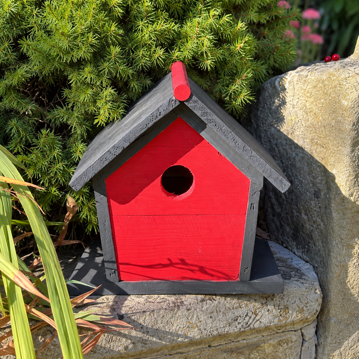 Painted example of the Ridge-Top Reclaimed Timber Birdhouse. Unpainted option is supplied without paint.